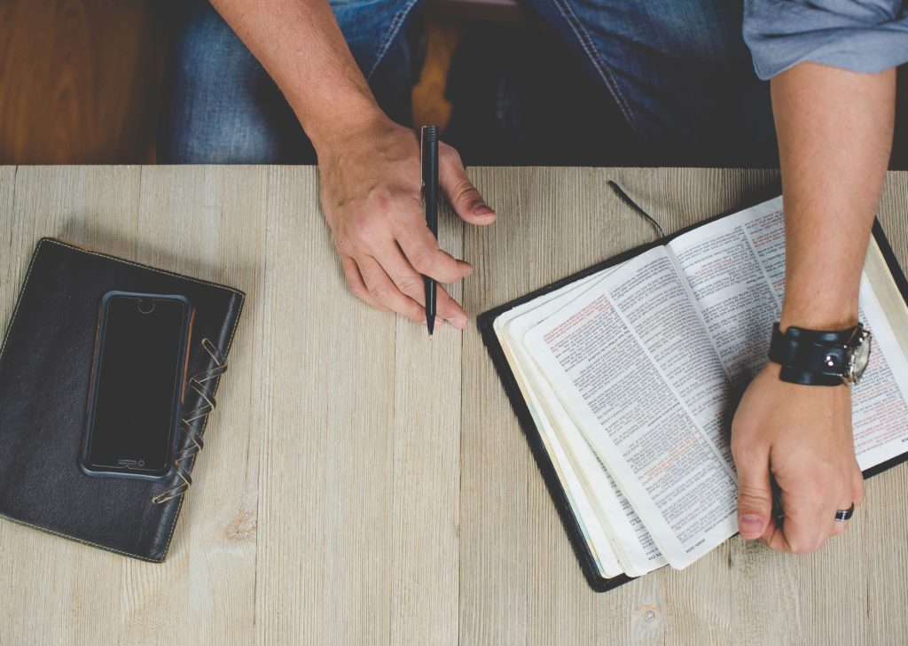 teen man doing personal bible study